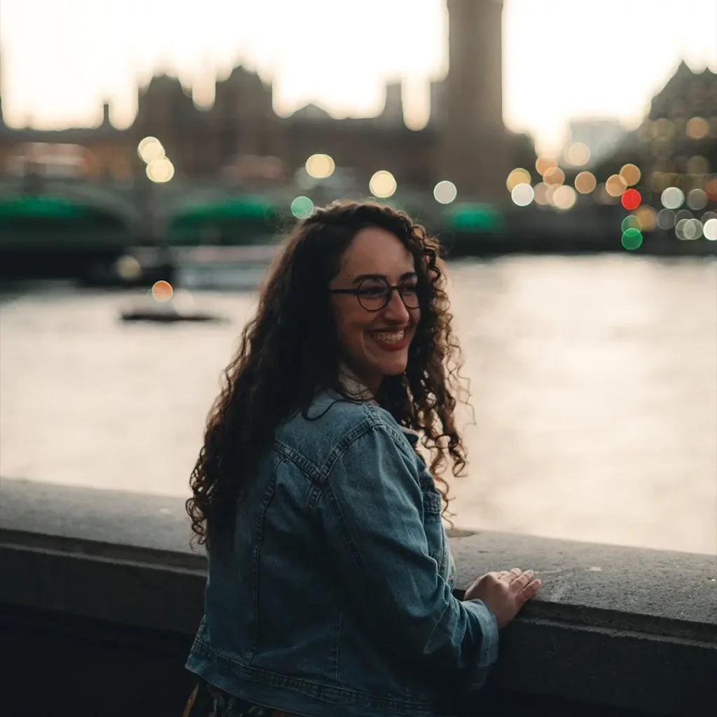 Marina Assis smiling in London during the day